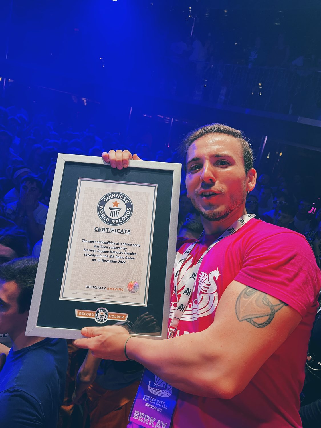 Berkay holding the Guinness World Records certificate at Sea Battle